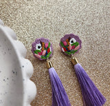 Elegant Purple Florals with Tassels