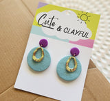 Amanda - Stone texture dangles. Round. Blue.
