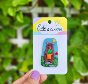Jimmy Bear PIN 🐻 with his fave plant, enjoying the sunshine.
