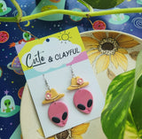 Alien Cowboy dangles. Pink alien with pink flower
