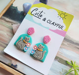 Grey Kitties with pink stud tops. Arch
