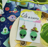 Alien Cowboy dangles. Green Alien with Green flower