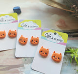 Kitten studs. Orange