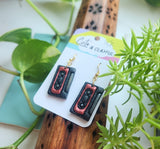 Mix tape cassette dangles. Grey and orangey red