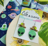 Alien Cowboy dangles. Green Alien with Green flower
