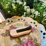 Chocolate Iced Finger Bun with Coconut Flakes Hair Clip