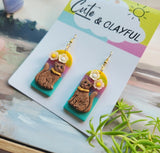 Brown kitties with rainbow background and hooks