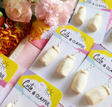 Milk bottle lolly dangles
