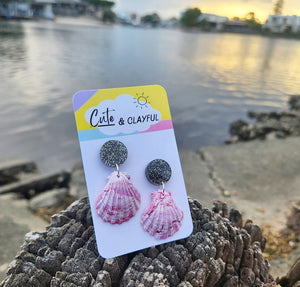 Shell dangles. Pinky tones with black sparkly stud tops