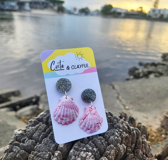 Shell dangles. Pinky tones with black sparkly stud tops