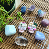 Sugar Skulls.. Hook dangles. White and Pink flowers