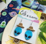 Alien Cowboy dangles. Blue Alien with brown hats