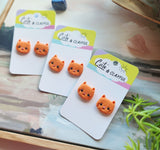 Kitten studs. Orange