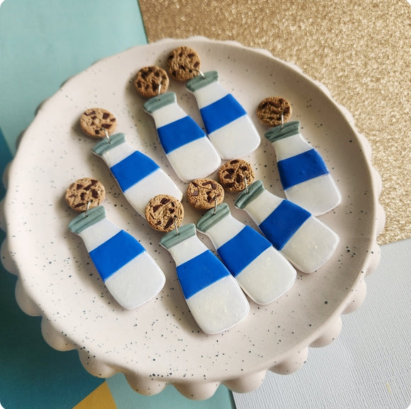 Milk bottle dangles with cookies