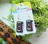 Mix cassette tape dangles. Gold and pink
