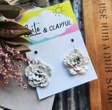 White metalic shimmer with black centre Flower Hoops