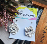 White metalic shimmer with black centre Flower Hoops