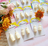 Milk bottle lolly dangles